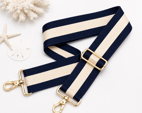 Strapistry Ocean Breeze Strap product spec sheet showing the 2 inch wide woven polyester webbing, adjustable 24-50 inch length, gold-tone hardware, and colorway swatches for crossbody, shoulder, and backpack carry
